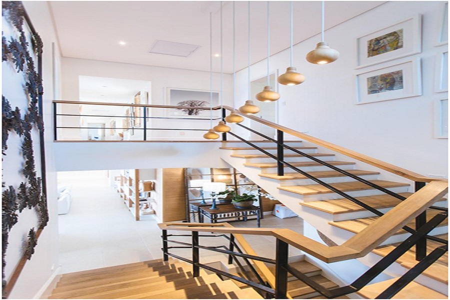 a living space with wooden stairs.